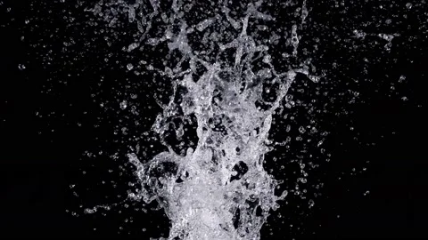 Super Slow Motion Shot of Real Water Splash Explosion from Isolated on Black at Stock Footage 234808779