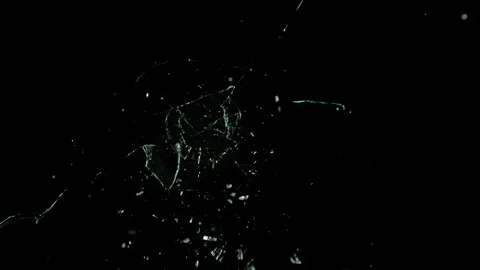 Super Slow Motion Shot of Real Bullet Glass Break Isolated on Black Background Stock Footage 326932395