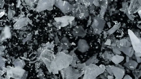 Super Slow Motion Shot of Real Ice Exploding Towards Camera on Black Background Stock Footage 327419623
