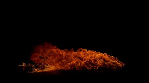 Super Slow Motion Shot of Real Big Floor Fire Explosion Isolated on Black at Stock Footage 338329032