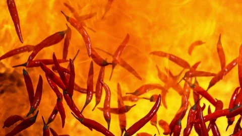 Super Slow Motion Shot of Red Chilli Peppers and Fire Explosion at 1000fps. Stock Footage 115216556