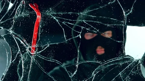 Super Slow Motion Shot of Robbery Concept at 1000 fps Isolated on Black Stock Footage 125798989