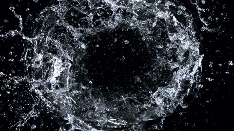 Super Slow Motion Shot of Rotating Water Ring Moving Towards Camera at 1000fps. 스톡 동영상 169608443