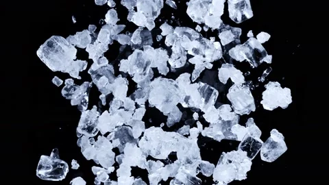 Super slow motion shot of rotating exploded crushed ice on black at 1000fps. 스톡 동영상 173049288