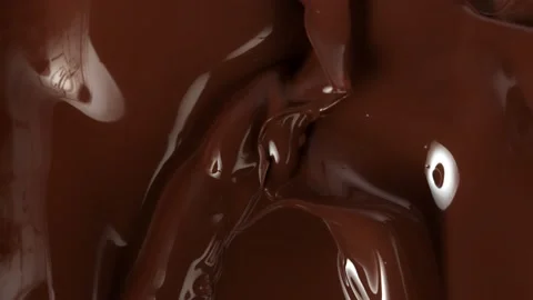 Super Slow Motion Shot of Splashing Melted Chocolate Background at 1000fps. Stock Footage 137035628