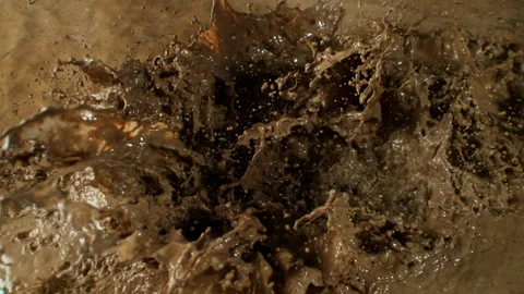 Super Slow Motion Shot of Splashing Mud Background at 1000fps. Stock Footage 331949376