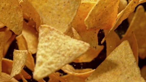 Super Slow Motion Shot of Tortilla Chips Flies After Being Exploded against Stock Footage 114453021