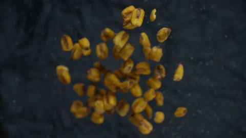 Super Slow Motion Shot of Tortilla Chips Falling on Black Background, Stock Footage 149201348