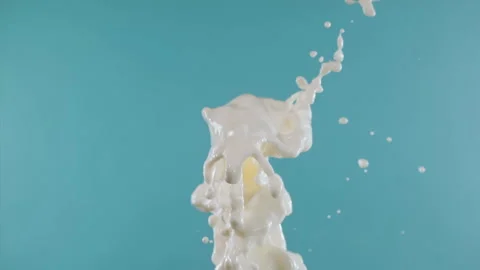 Super Slow Motion Shot of Vertical Splashing Fresh Milk at 1000 fps. Stock Footage 276082922