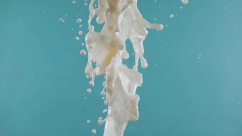 Super Slow Motion Shot of Vertical Splashing Fresh Milk at 1000 fps. Stock Footage 276083203