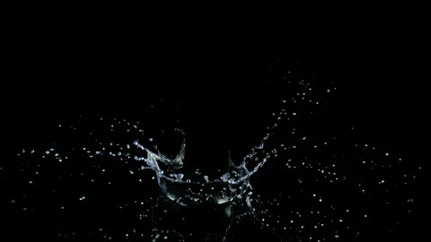 Super Slow Motion Shot of Water Crown Splash Isolated on Black Background at Stock Footage 339564507