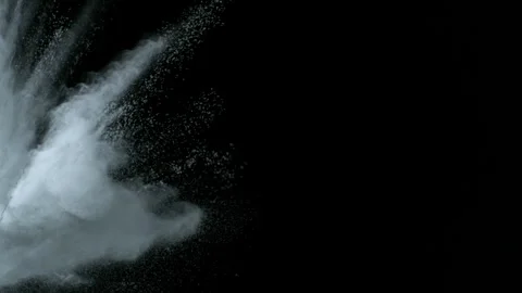 Super Slow Motion Shot of White Powder Blow Isolated on Black Background at Stock Footage 340470305