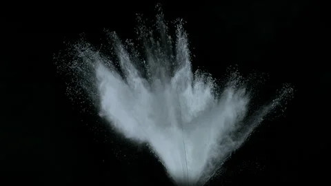 Super Slow Motion Shot of White Powder Blow Isolated on Black Background at Stock Footage 341248519