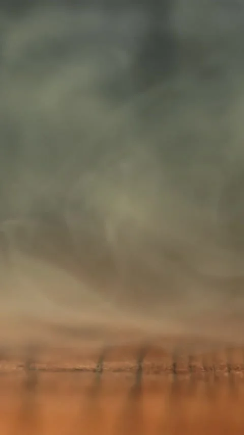 Super slow motion Smoke over a wooden table . Filmed on a high-speed camera at Stock Footage 335375395