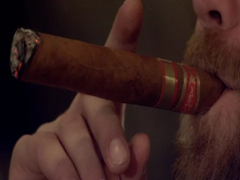 Super Slow Motion Smoking a Cigar Stock Footage 71507624