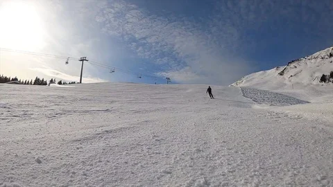 Super slow motion: snow avalanche, skier spraying snow Stock Footage 125048965