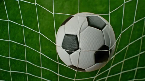 Super Slow Motion Soccer Ball Hitting Goal Net on Green Field, 1000fps. Stock Footage 306082742