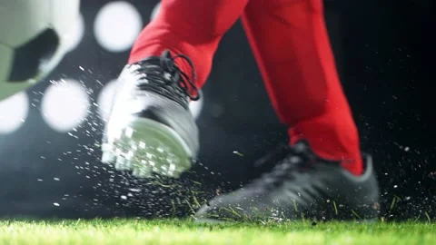 Super slow motion of soccer player kicking the ball Stock Footage 144902689