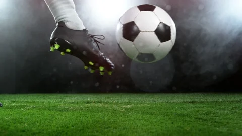 Super slow motion of soccer player kicking the ball Stock Footage 173596136