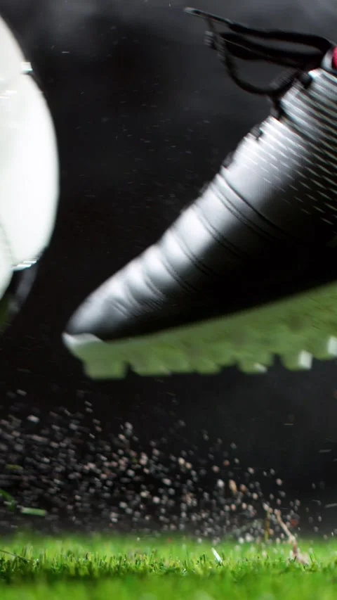 Super Slow Motion of Soccer Player Kicking the Ball, Close-up. Stock Footage 295953449