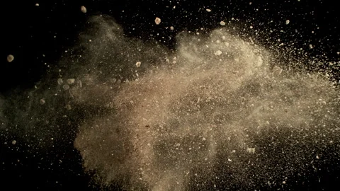 Super Slow Motion of Soil, Rocks and Dust Colliding with Each Other Isolated on Stock Footage 320393313