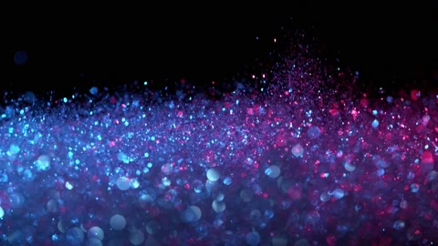 Super slow motion of sparkling abstract glittering background in neon colors Stock Footage 137912266