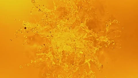Super slow motion of splashing cola/whiskey/tea isolated on orange background. Stock Footage 229725630