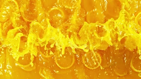 Super Slow Motion of Splashing Orange Juice. Stock Footage 243112981