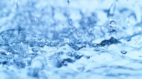 Super slow motion of splashing water drops, filmed on macro lens Stock Footage 99017968