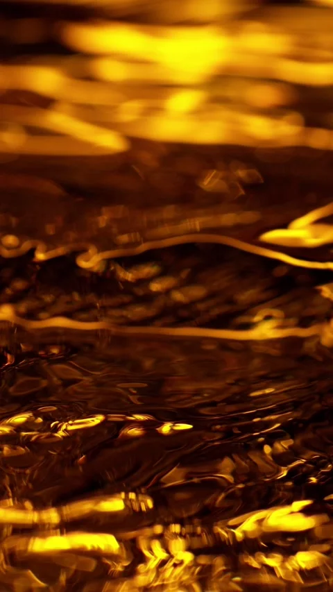 Super slow motion of splashing whiskey, close-up. Stock Footage 306656975
