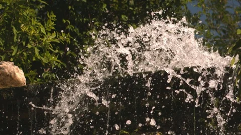 Super Slow Motion Static Tight Shot of a Mayan Ruin Waterfall Stock Footage 82877764