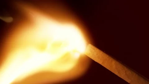 Super slow motion of striking matches, macro view, black background. Stock Footage 145336752