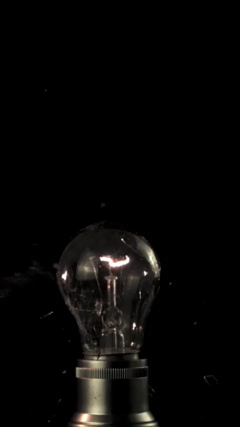 Super slow motion three light bulbs explode. Filmed on a high-speed camera at Stock Footage 335285466