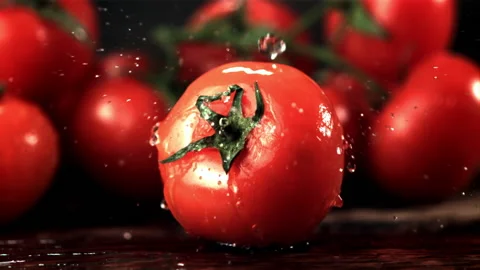 Super slow motion on the tomato drips wa... | Stock Video | Pond5