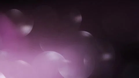 Super slow motion video of bright bokeh light from a point light Видео 318675143