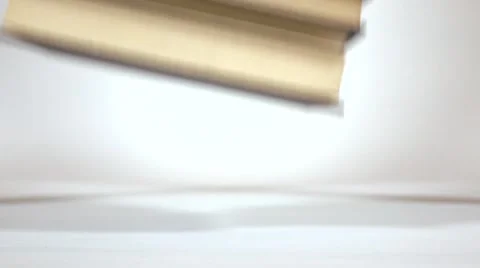 Super slow motion video of falling books Stock Footage