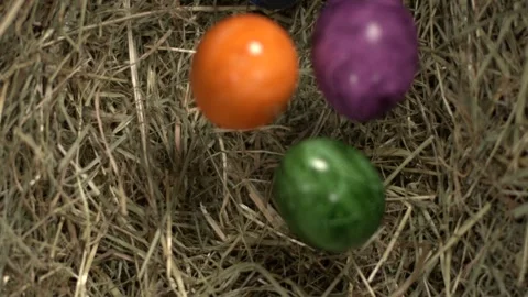 Super Slow Motion Vividly Painted Eggs Slowly Fall, Vividly Painted Eggs Softly Stock Footage 327096728