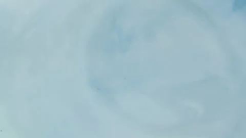 Super slow motion of a water drop splashing into a calm liquid surface, cre.. Stock Footage 335139571