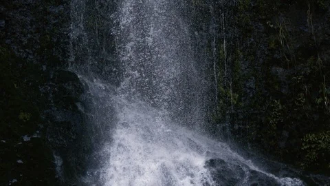Super slow motion water falling down rocky waterfall (anamorphic lens) Stock Footage 90732645