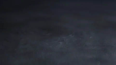 Super Slow Motion of a Water Puddle Stock Footage 270408023