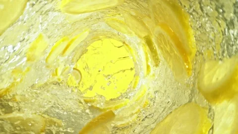 Super Slow Motion of Water Wave with Lemon Slices. Stock Footage 244516032