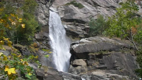 Super slow motion waterfall. Mountain flowing water. Slow motion 4K Video stock 236396299