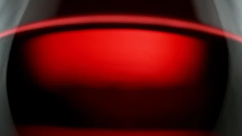 Super slow motion of waving red wine in macro shot. Vídeo Stock 120959499