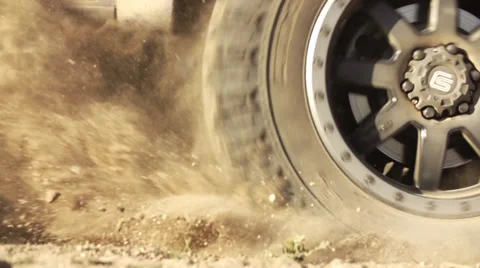 Super Slow Motion Wheel Spinning In Dirt Offroad Stock Footage