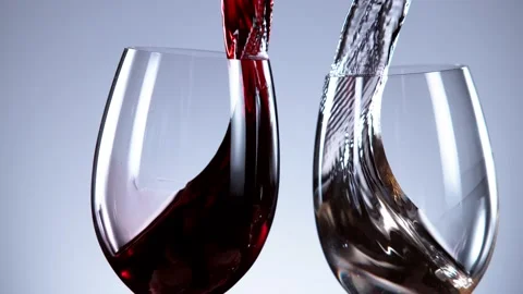 Super slow motion of white and red wine glasses in cheers gesture. Stock Footage 147278711