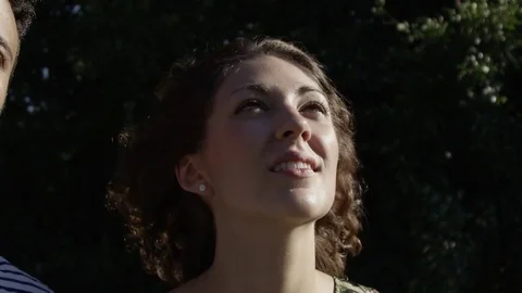 Super Slow Motion Of Young Woman's Face Staring At Drone Hair Blowing In The Stock Footage 82593729