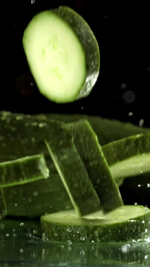 Super slow motion zucchini slices . Filmed on a high-speed camera at 1000 fps Stock Footage 335371505