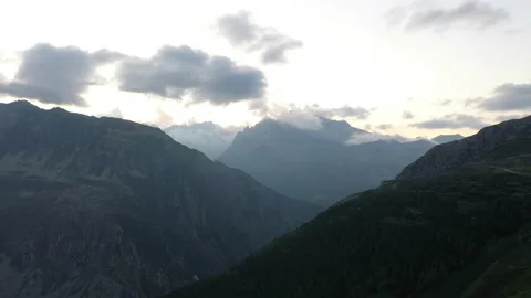 Super slow paning drone shot of valley and mountains in Switzerland. Video stock 143464089