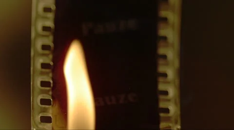 Super slowmotion burning celluloid film Stock Footage