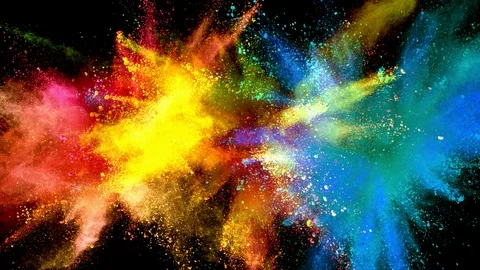 Super slowmotion shot of color powder explosions isolated on black background Stock Footage